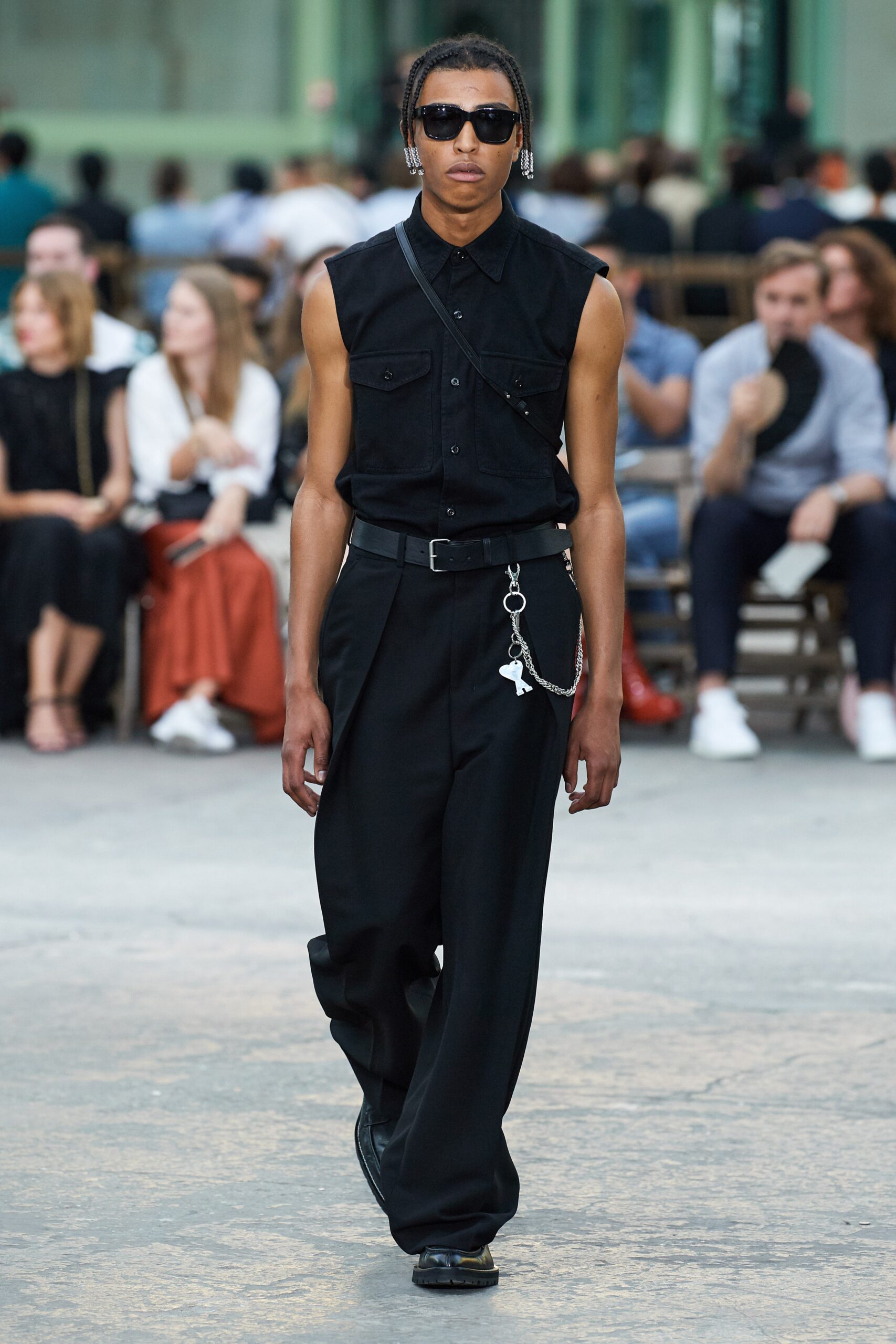 black sleeveless shirt and relaxed pants