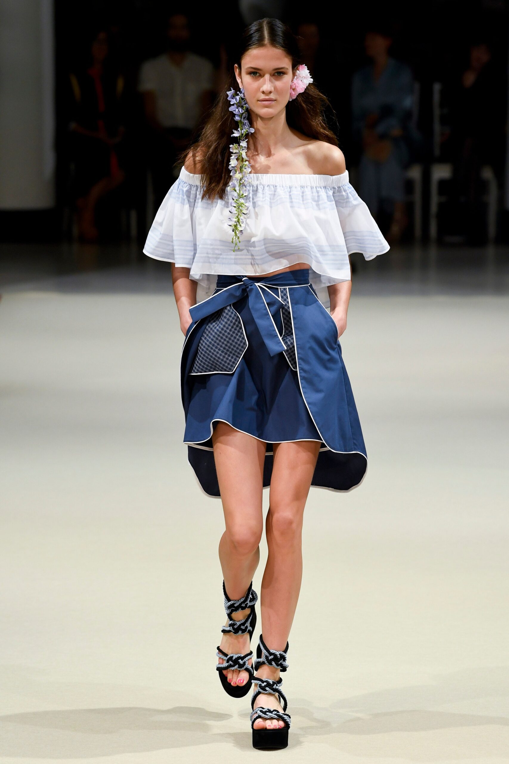 white off-shoulder top with blue skirt