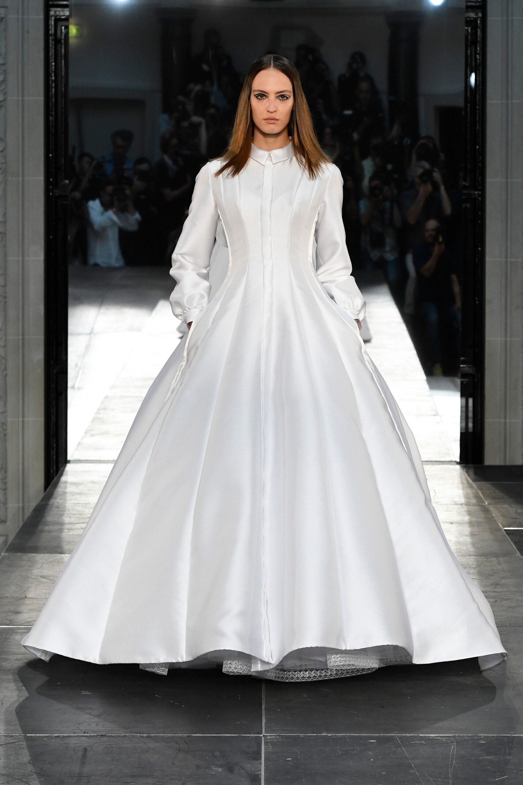white silk long-sleeve gown