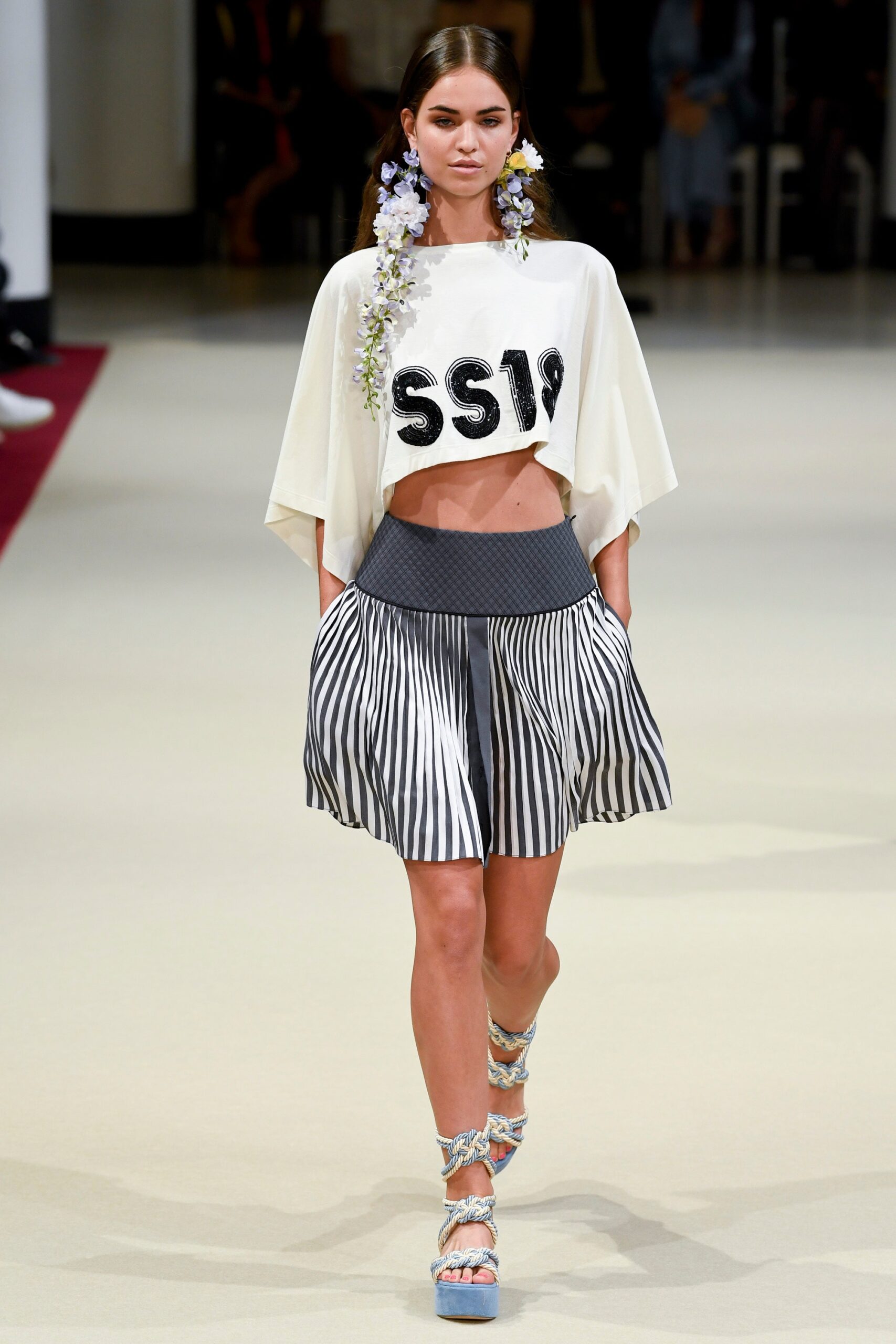 white cropped top with striped skirt