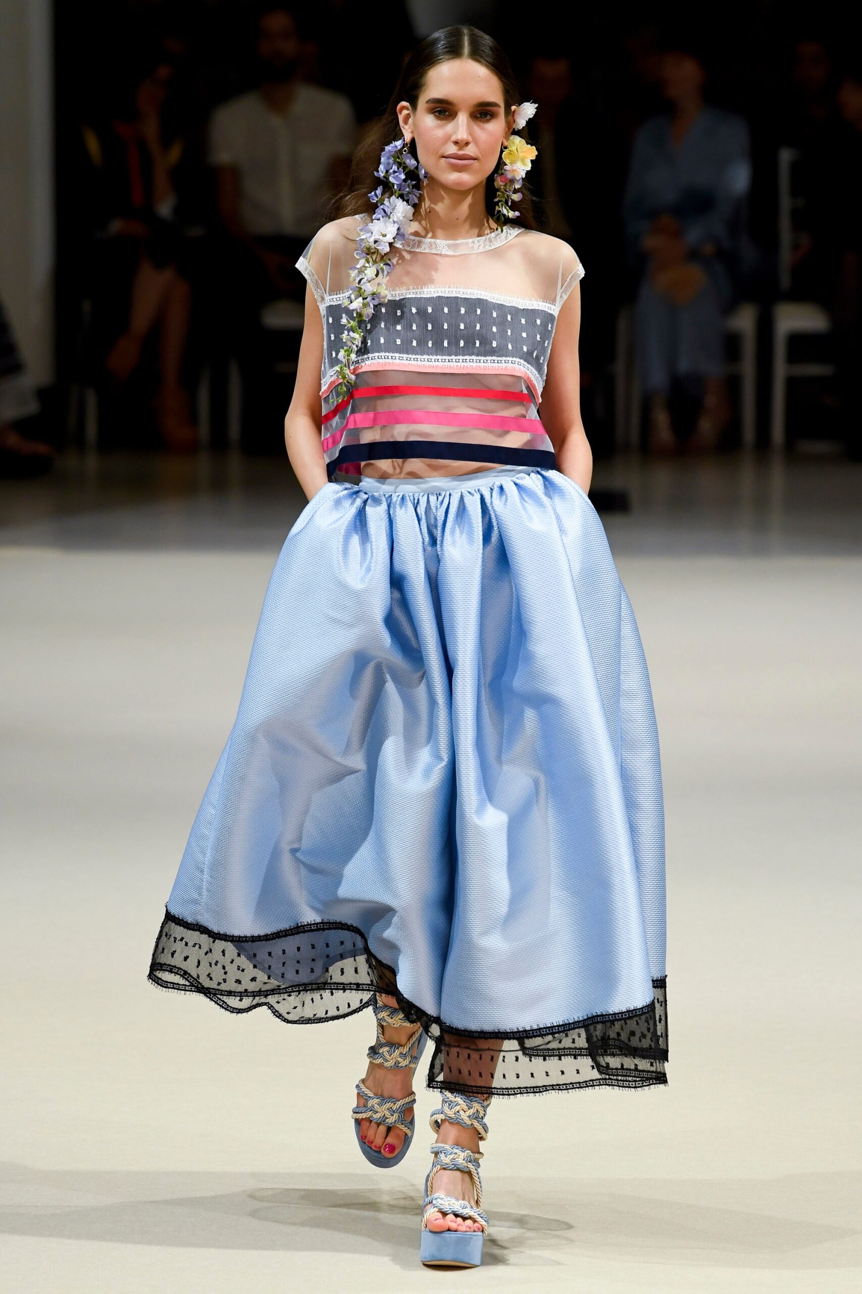 multi-colored sheer top with blue skirt
