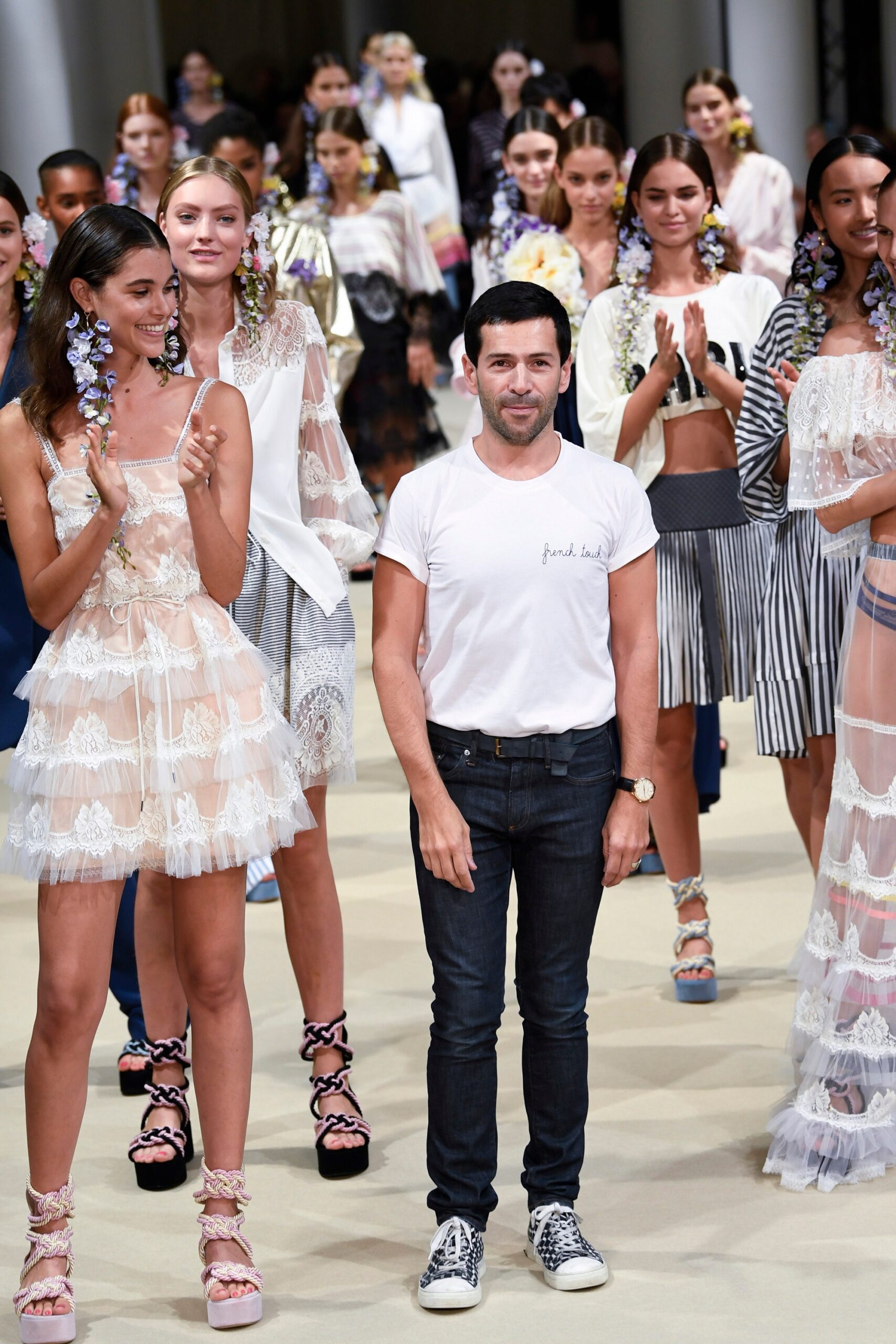 white lace mini dress and denim pants
