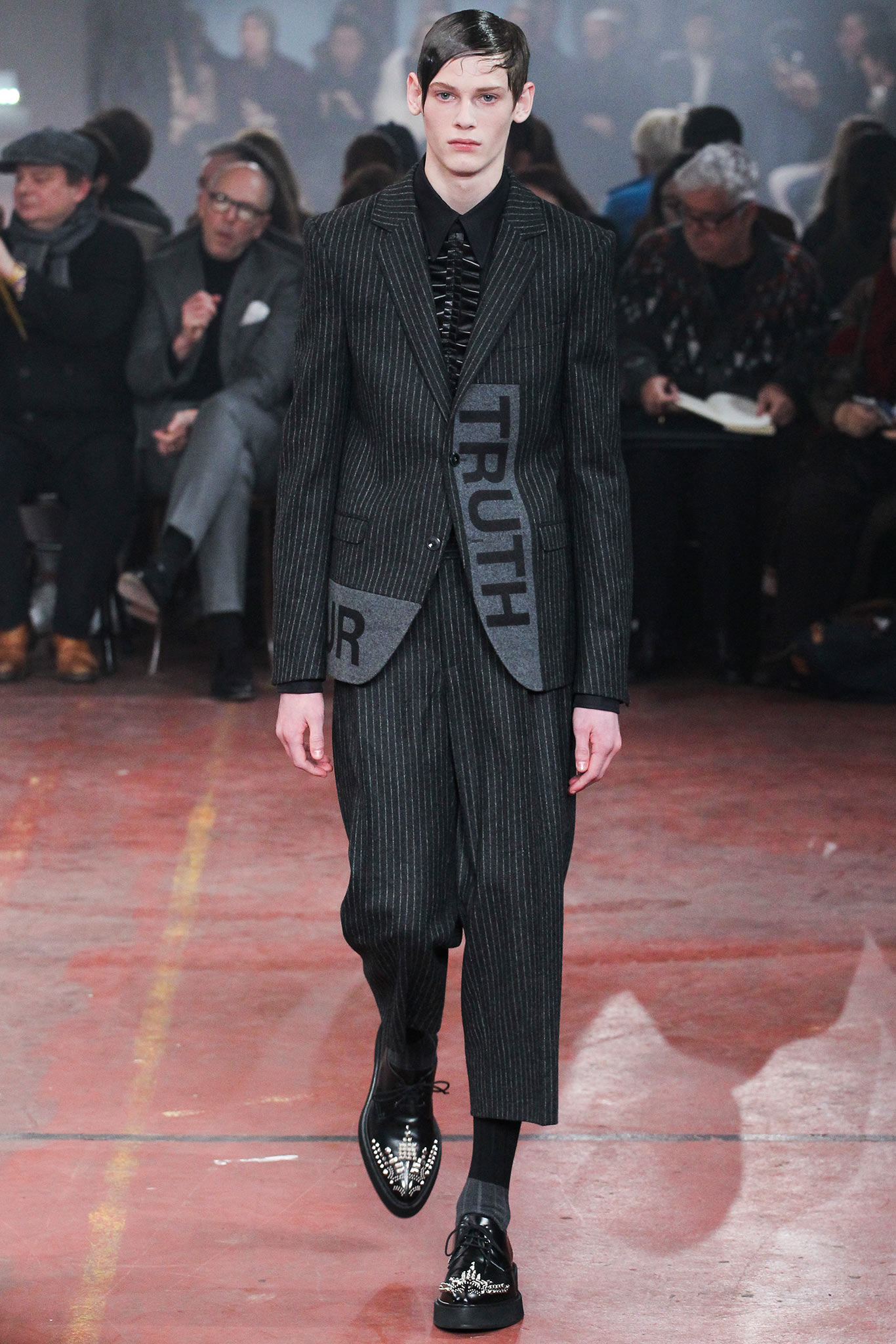 black and gray tailored suit
