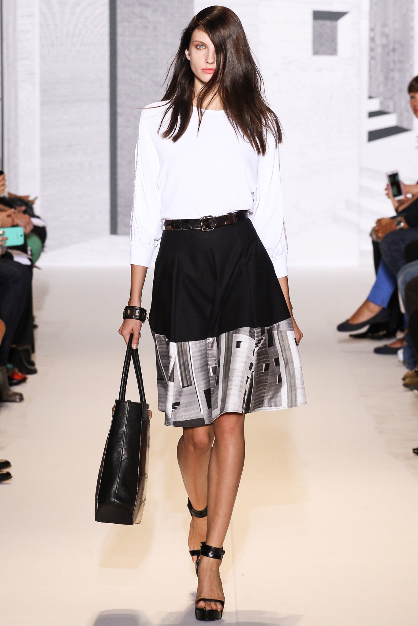 white fitted blouse and black a-line skirt