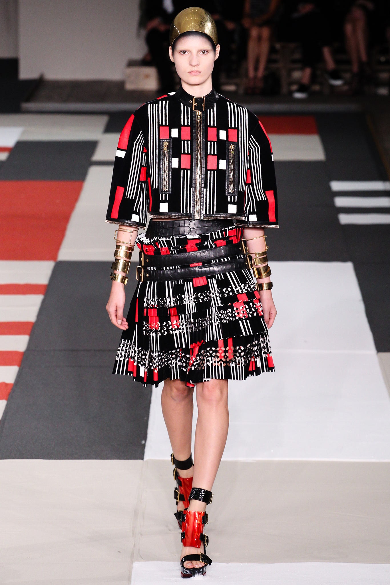 fitted black and red top with pleated mini skirt