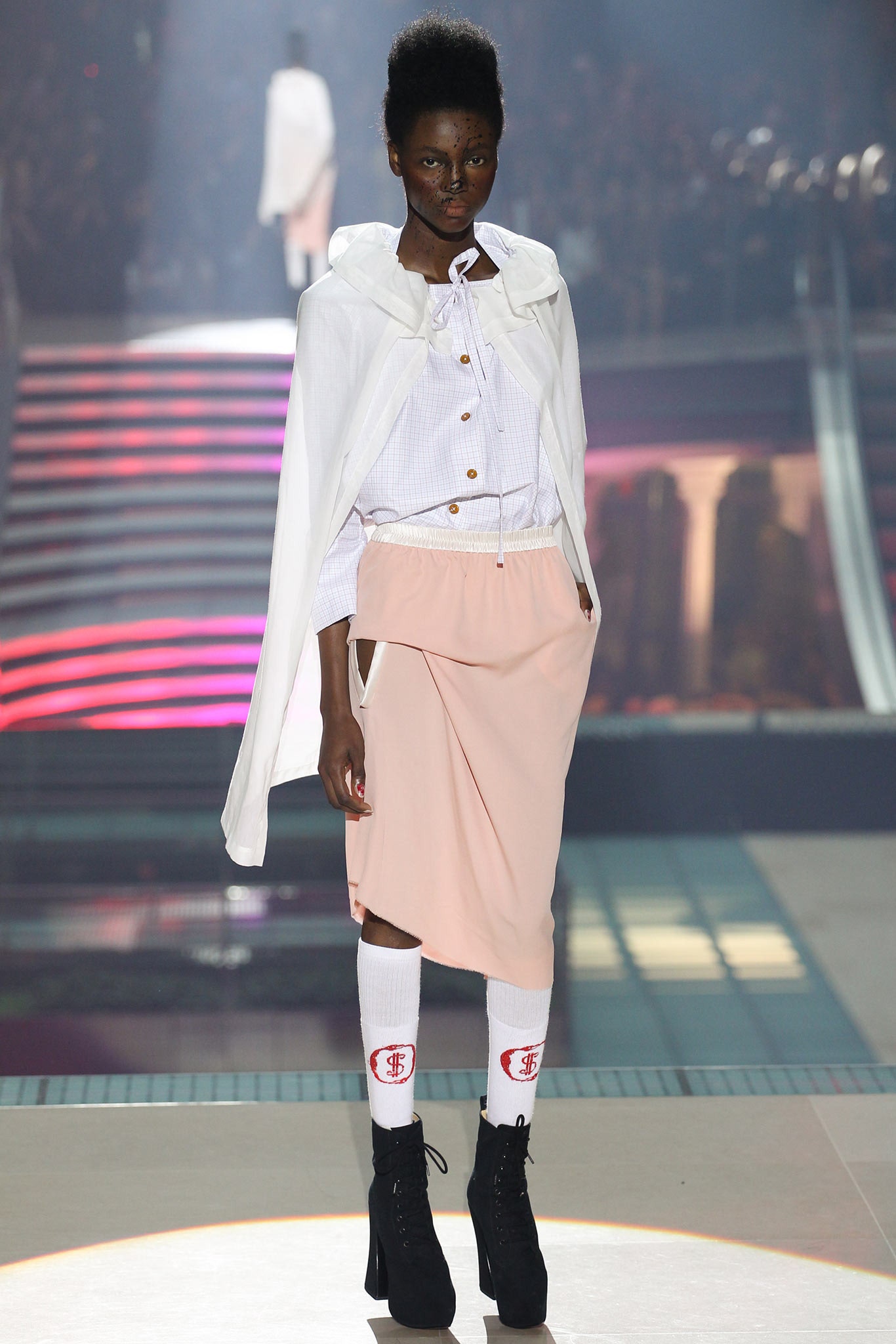 white cape and pink skirt