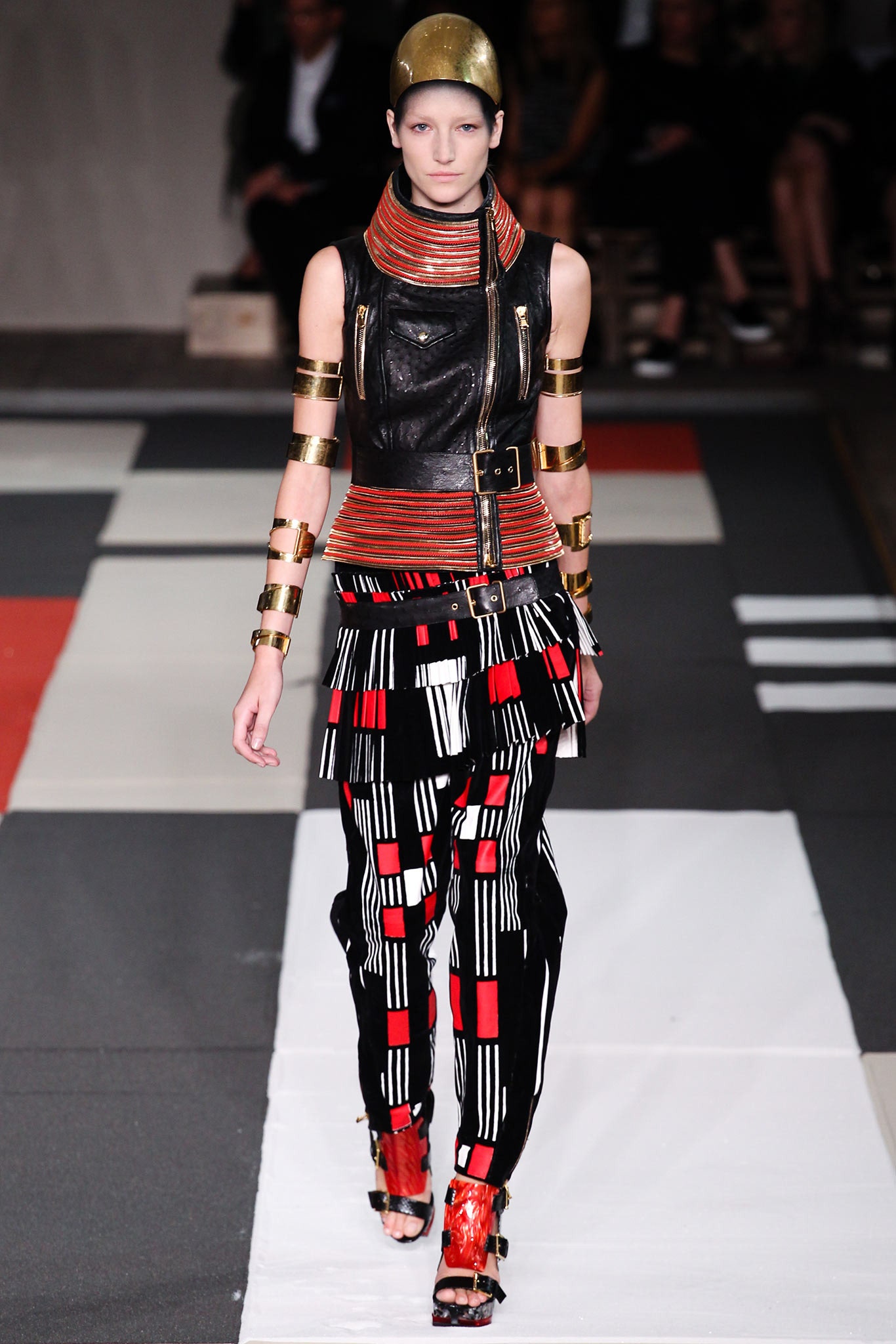 fitted black leather top with printed pants