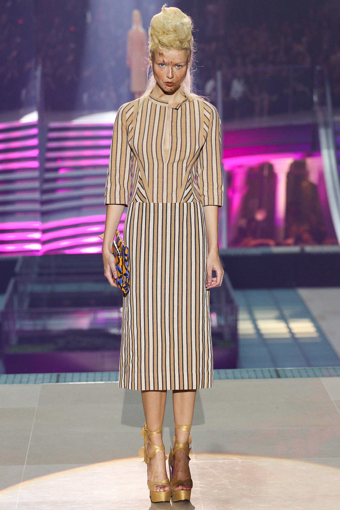 striped midi dress with clutch