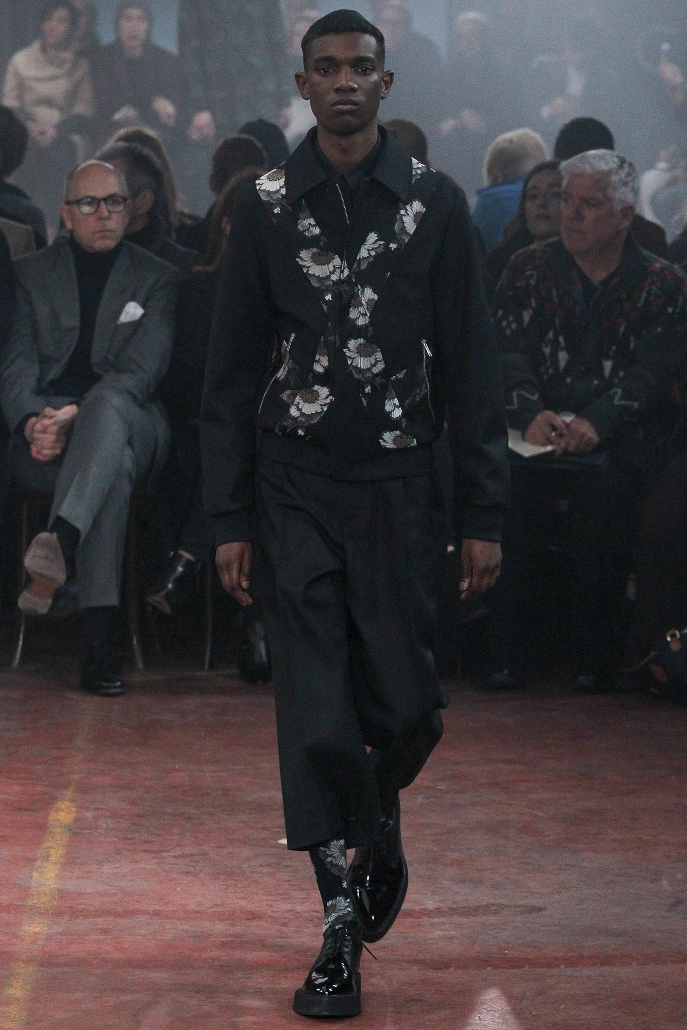 black and white printed jacket with wide-leg pants