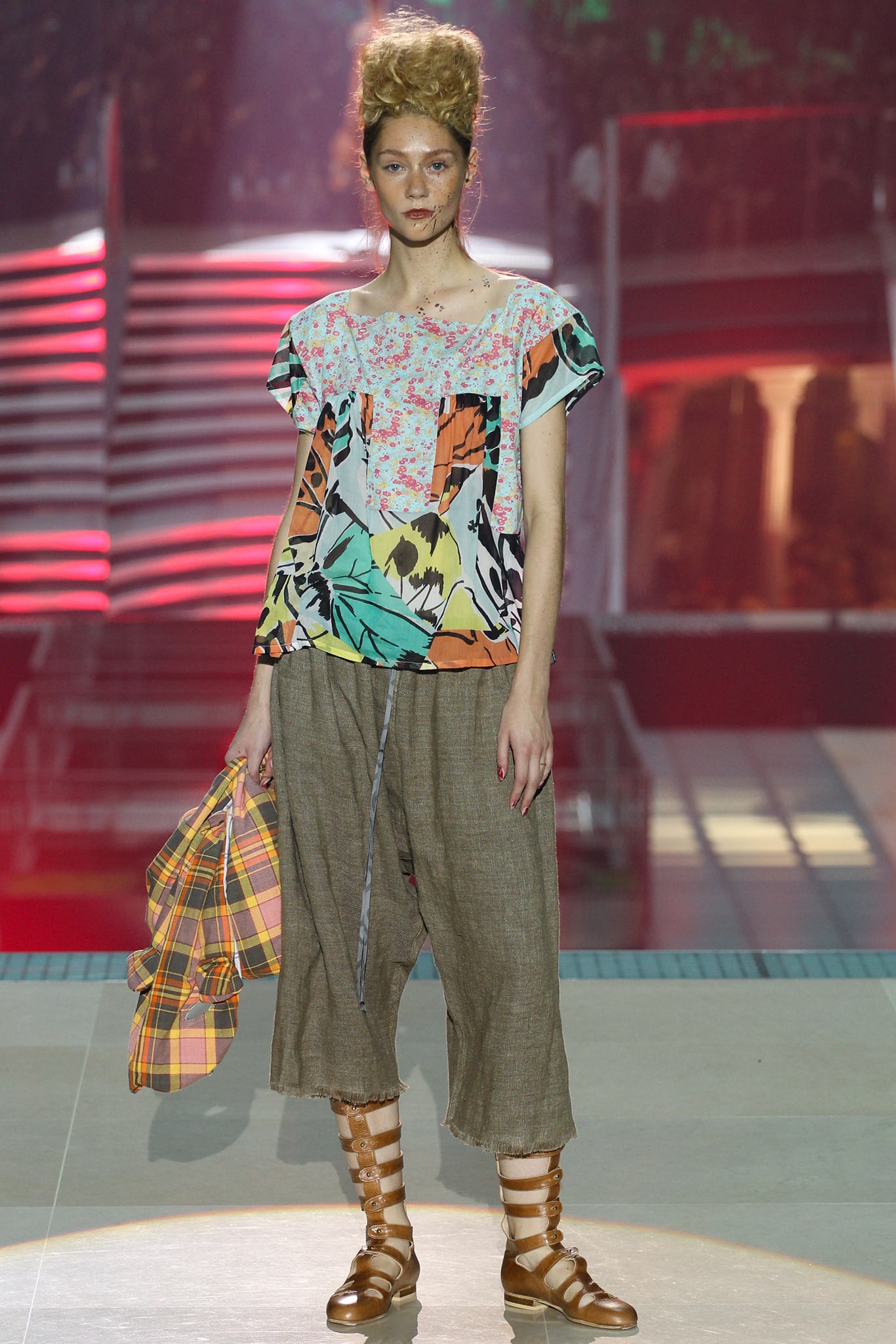 multi-colored relaxed top with beige pants