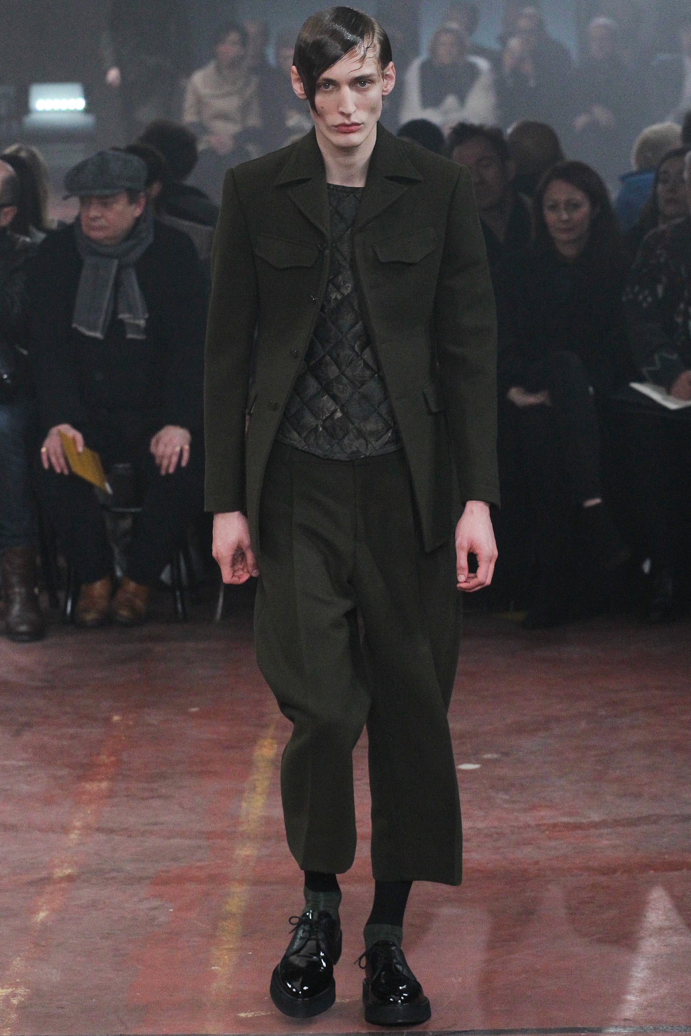 green tailored suit with relaxed pants