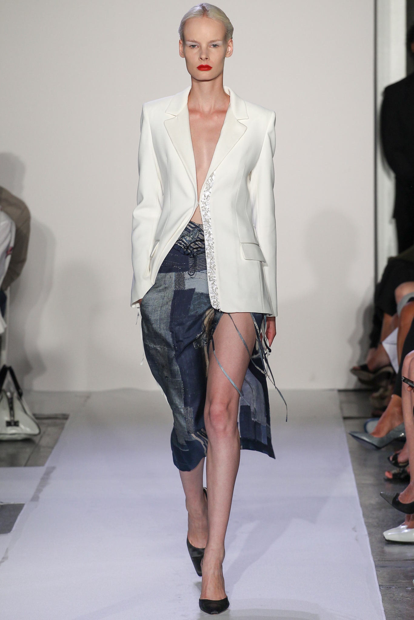 white tailored blazer and blue asymmetric skirt