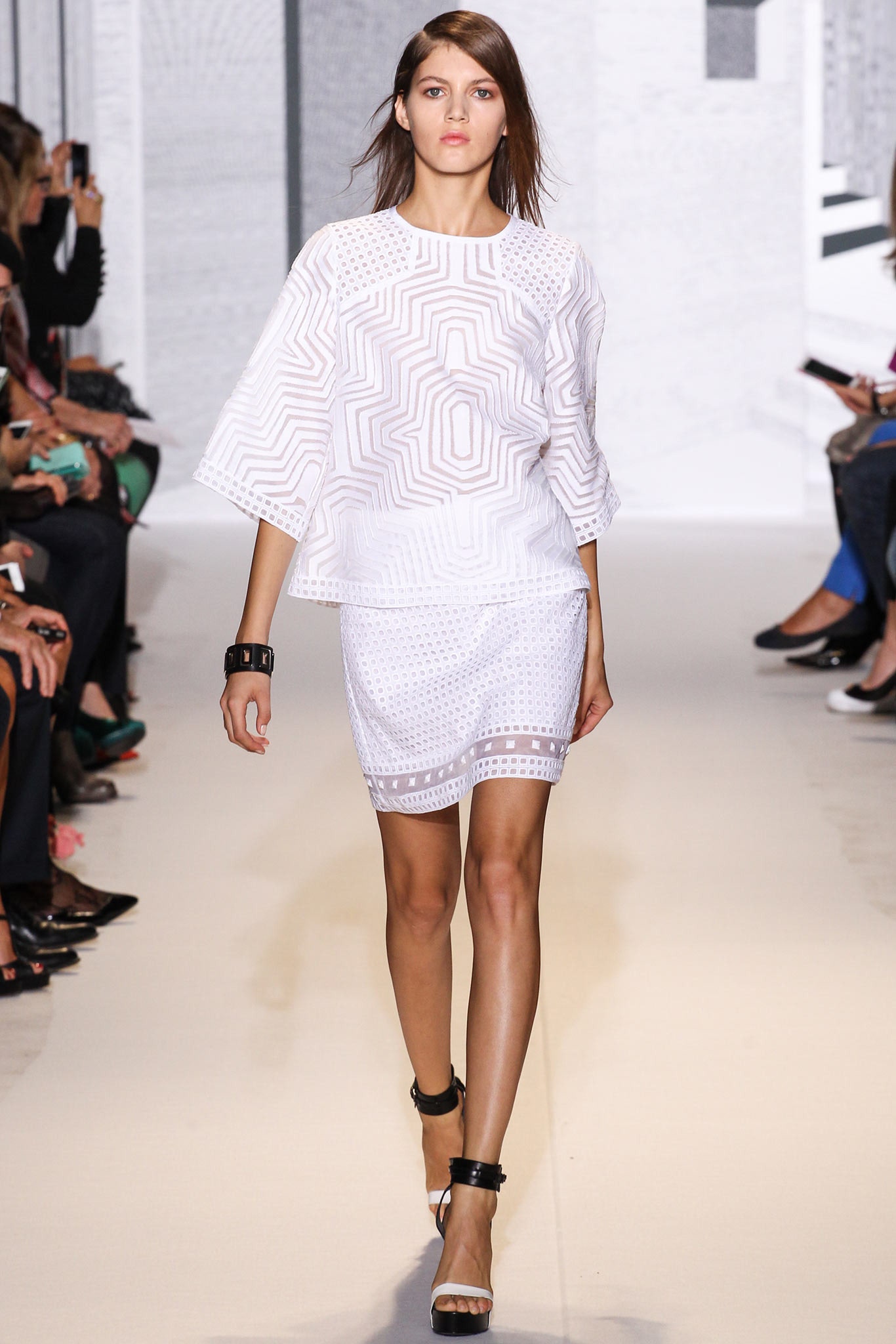 white relaxed top with mini skirt