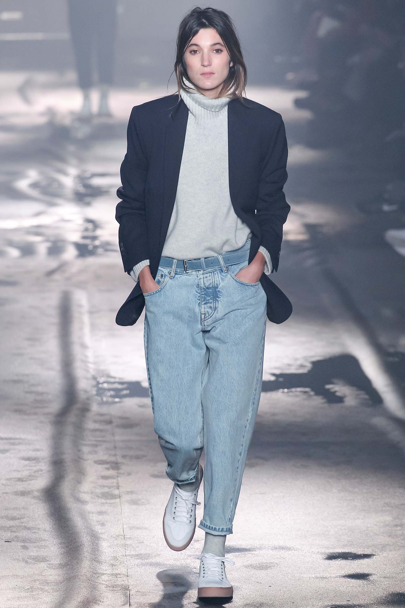 black blazer gray sweater blue pants