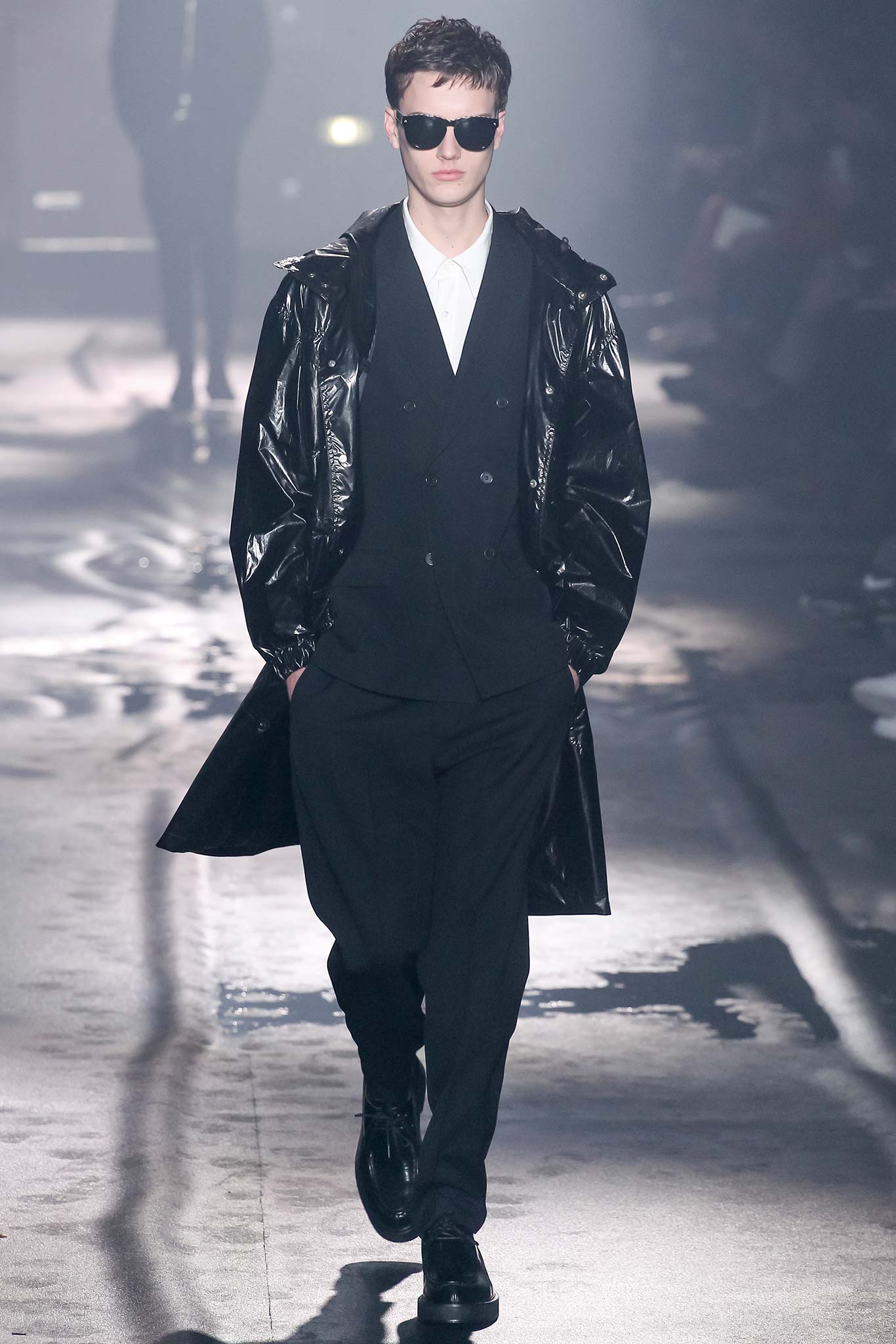 black vinyl coat with tailored pants