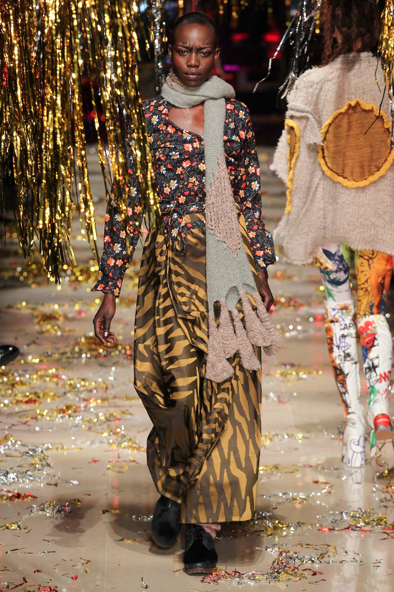 floral blouse with animal-print skirt