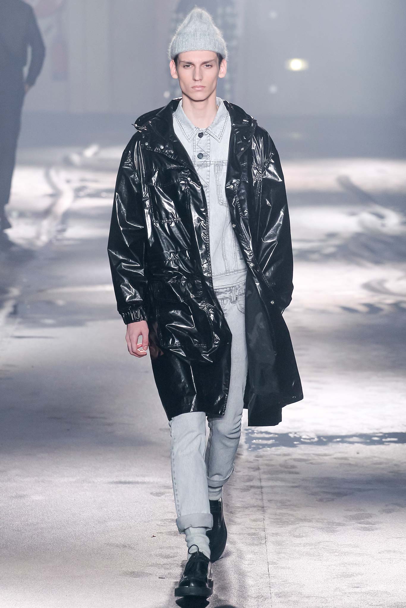 black vinyl coat with denim shirt