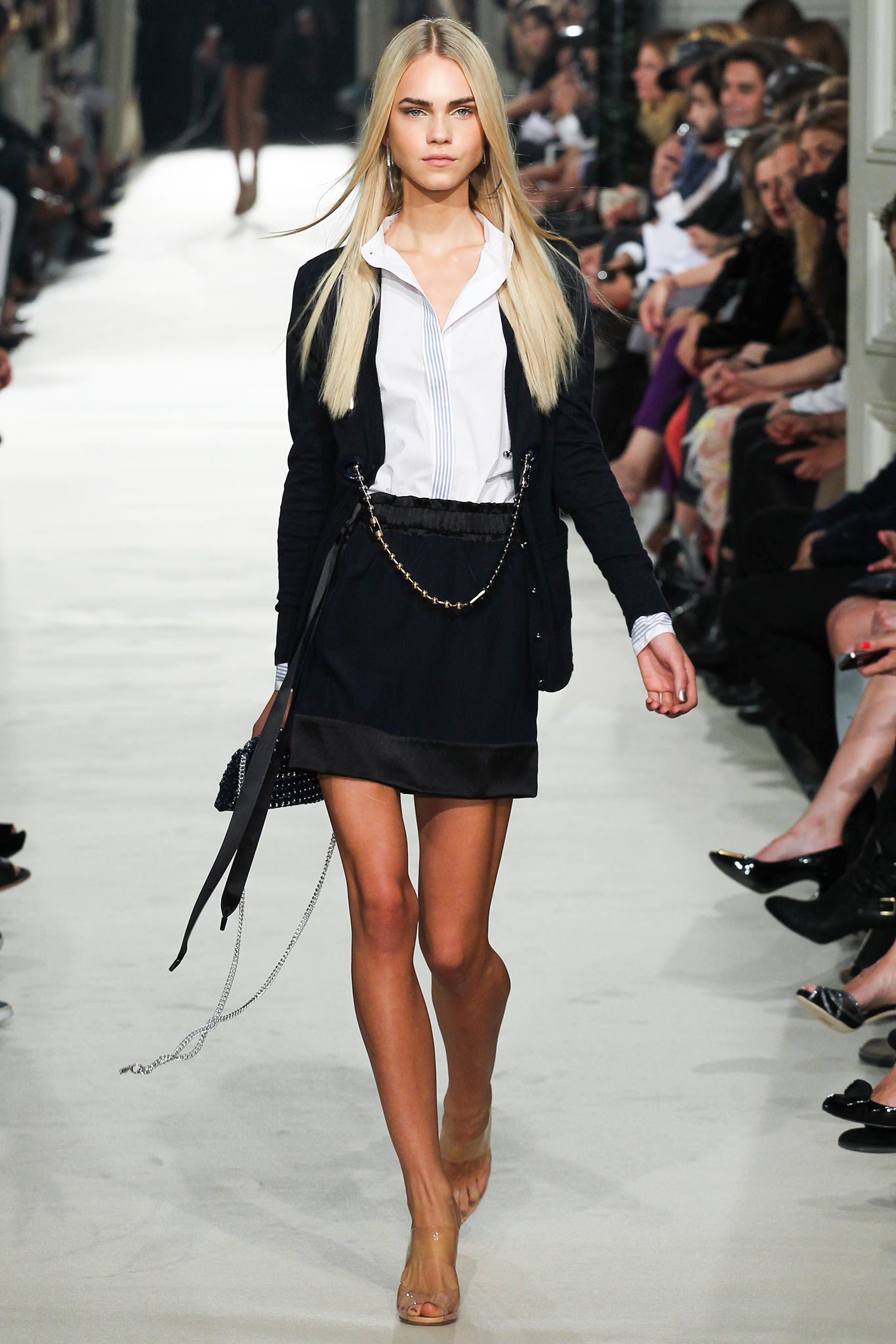 white blouse black blazer mini skirt