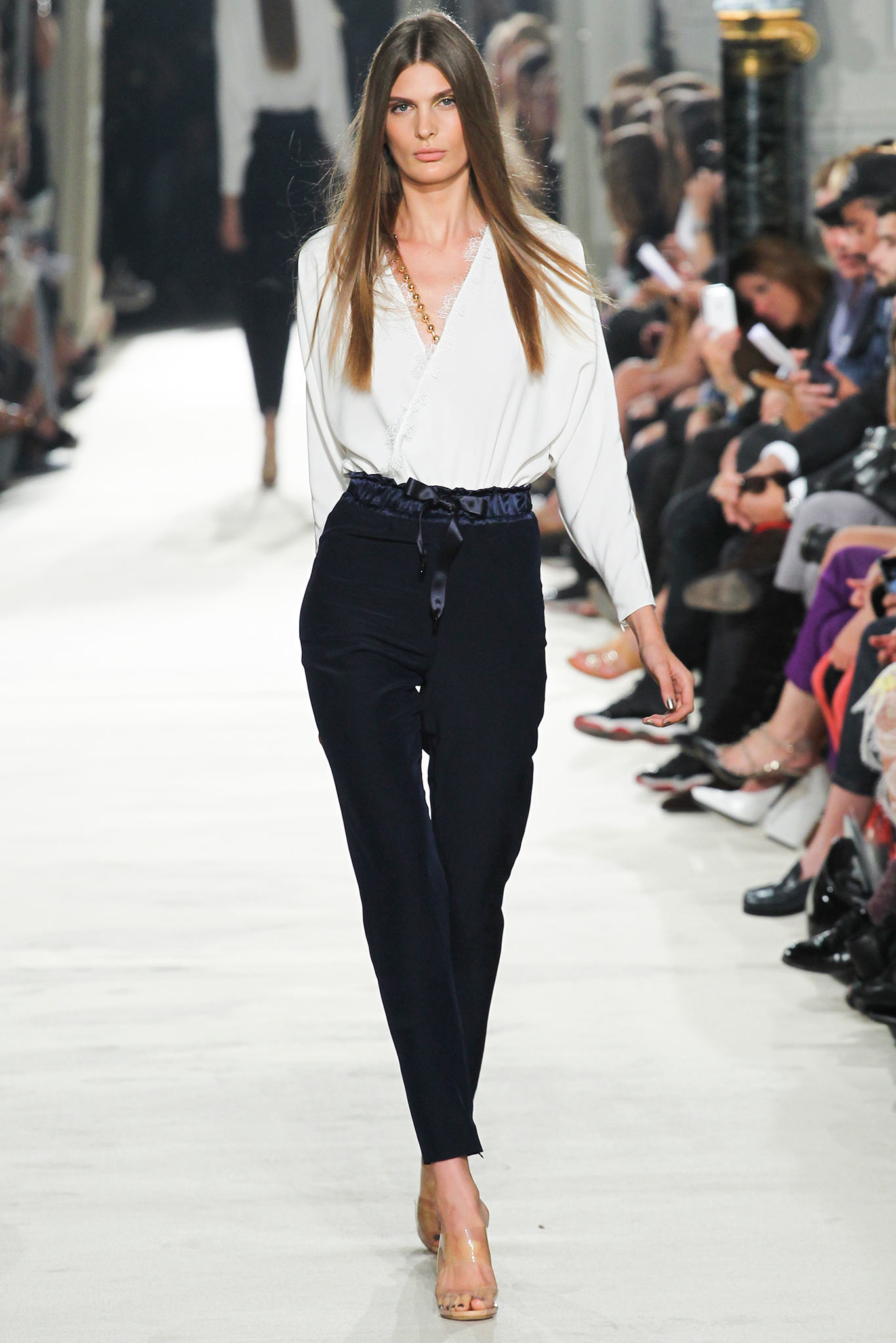 white silk blouse black pants
