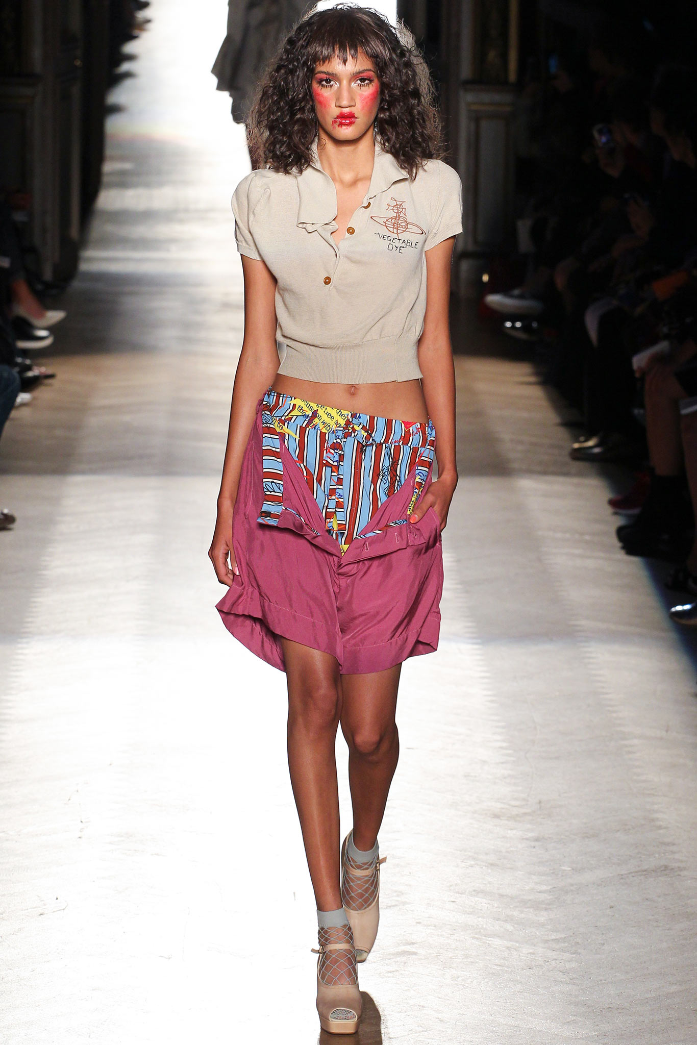 beige fitted top with pink skirt
