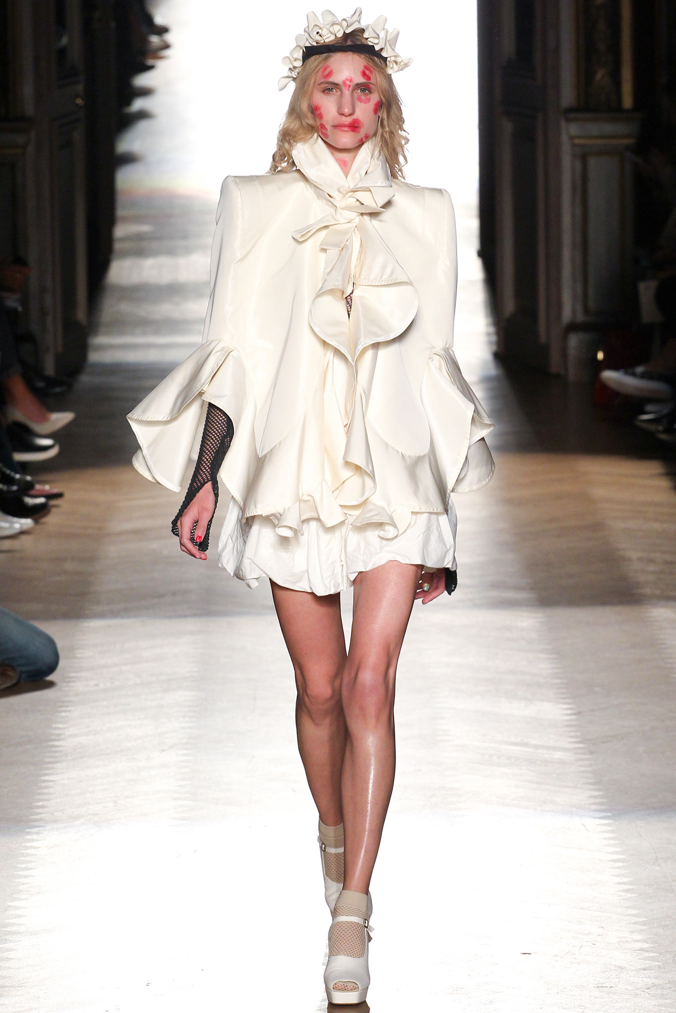 white silk long-sleeve collared structured ruffled cape