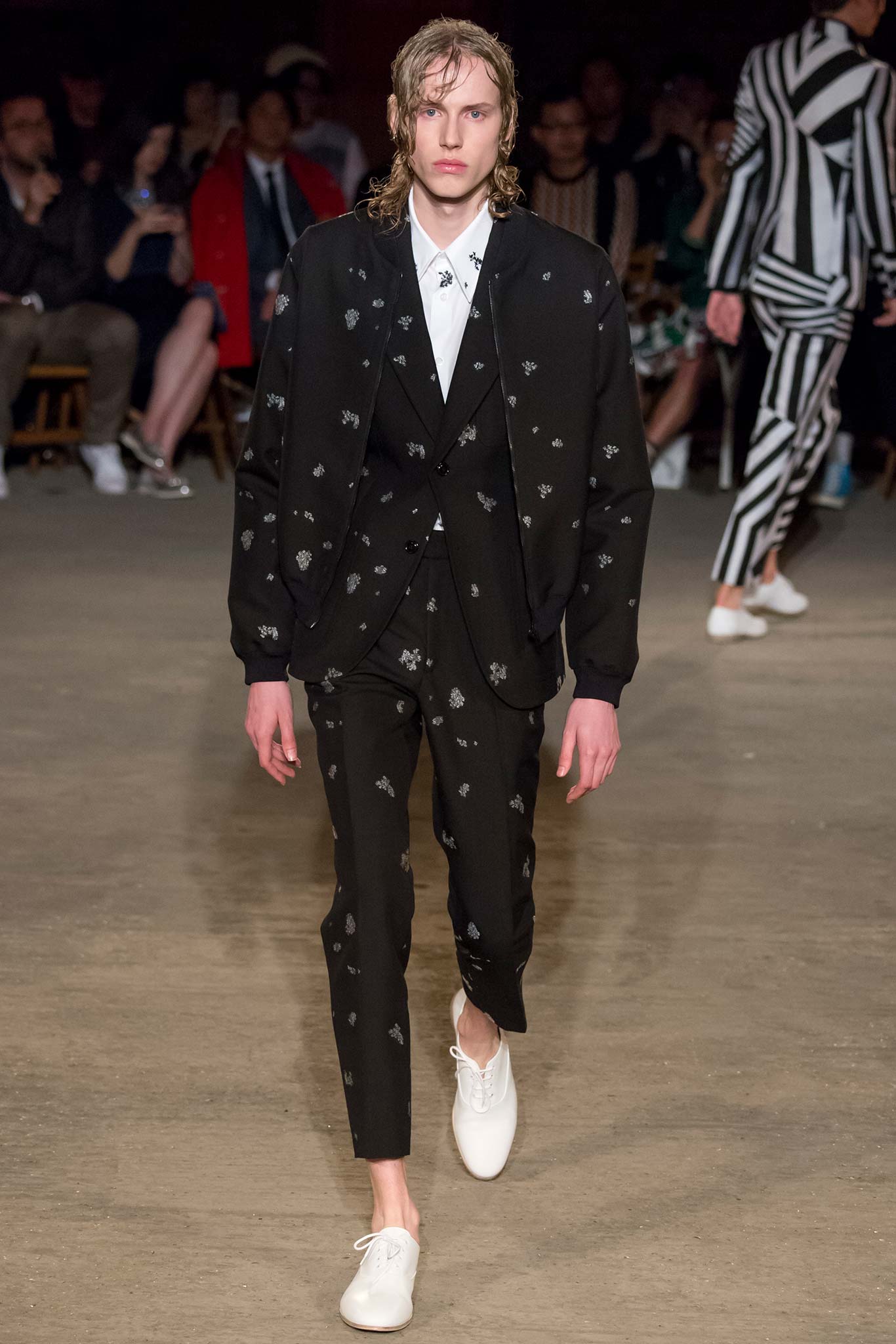black tailored suit with embroidered details
