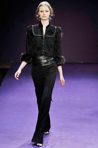 black fur jacket and silk pants
