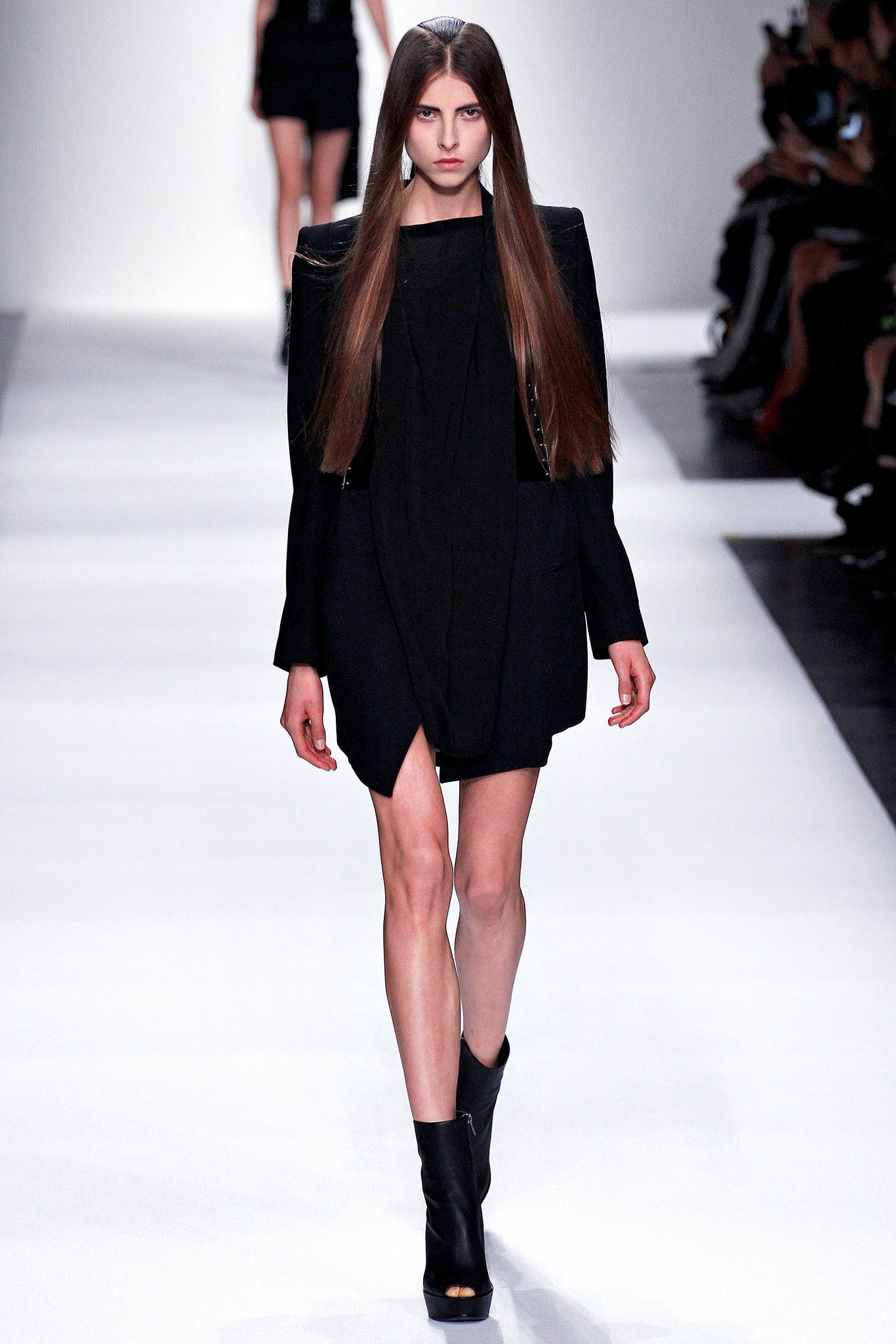 black fitted mini dress with boots