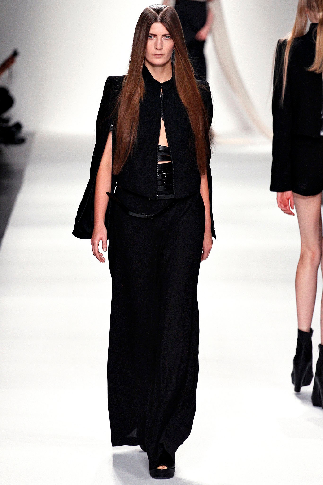 black silk fitted jacket and relaxed pants