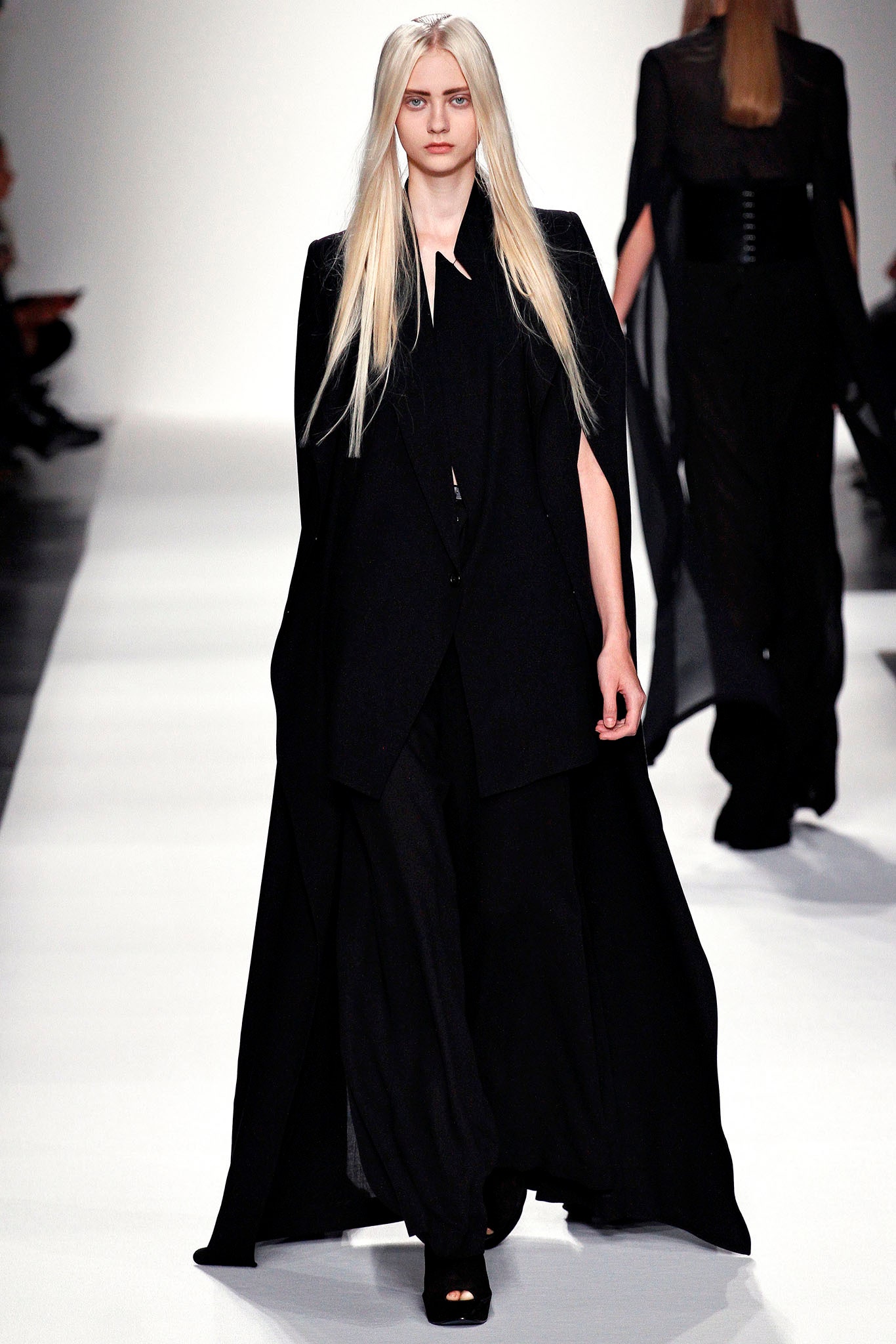 black wool cape and jumpsuit