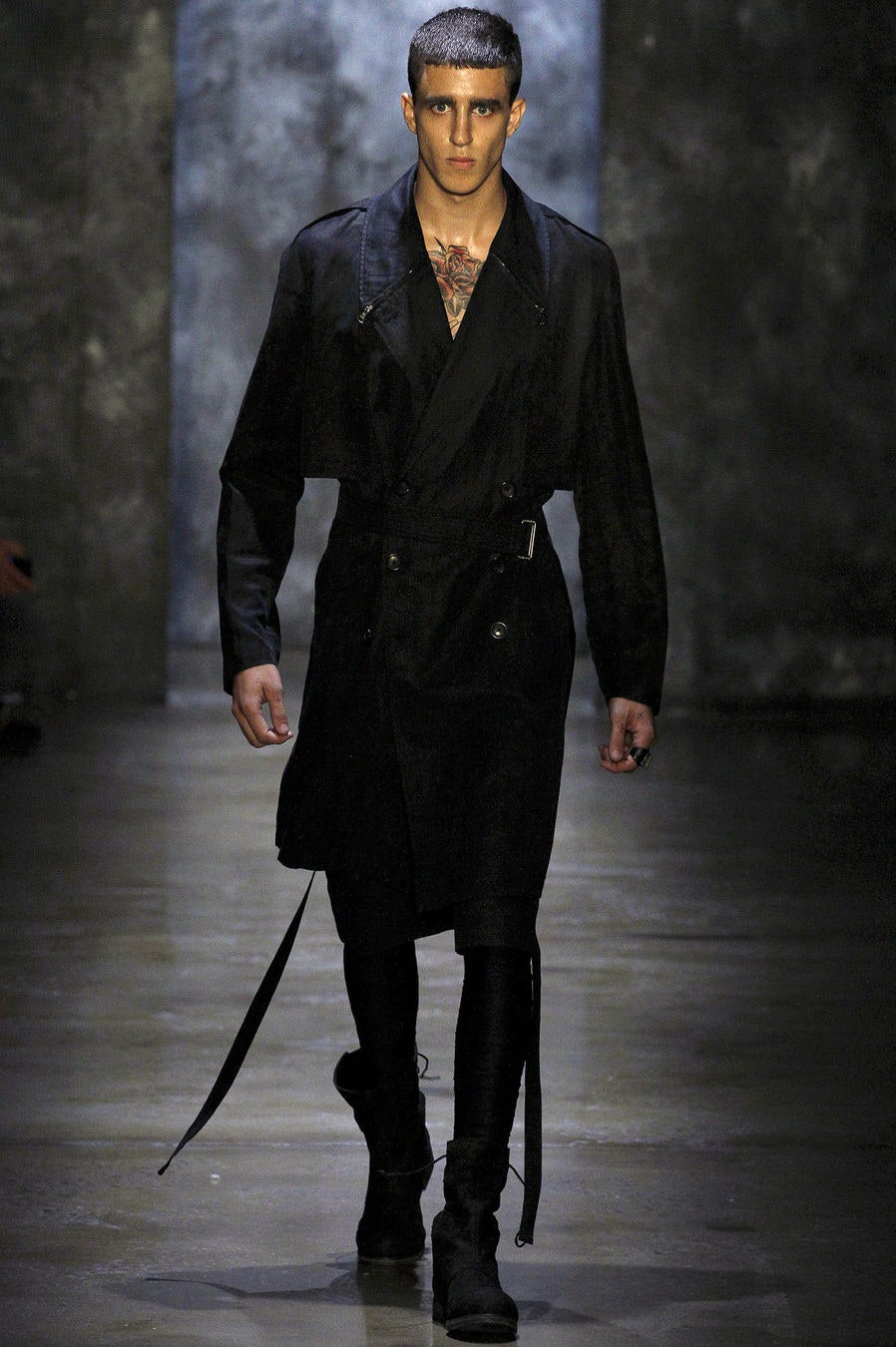 black fitted trench coat and pants