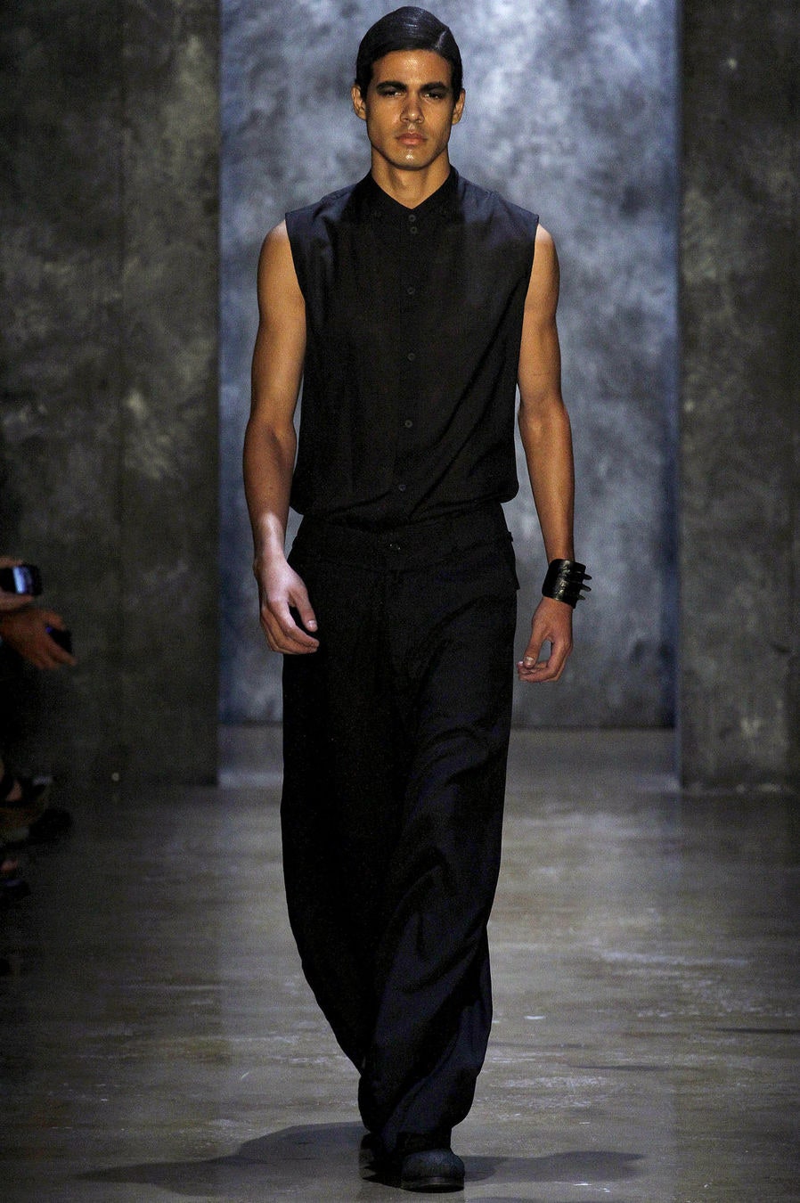 black sleeveless shirt and relaxed pants