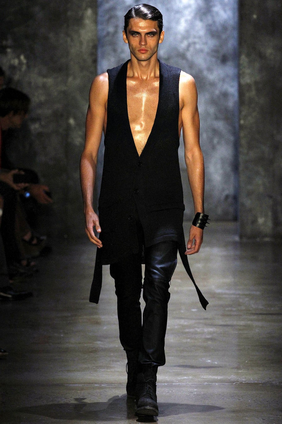 black fitted vest with leather pants