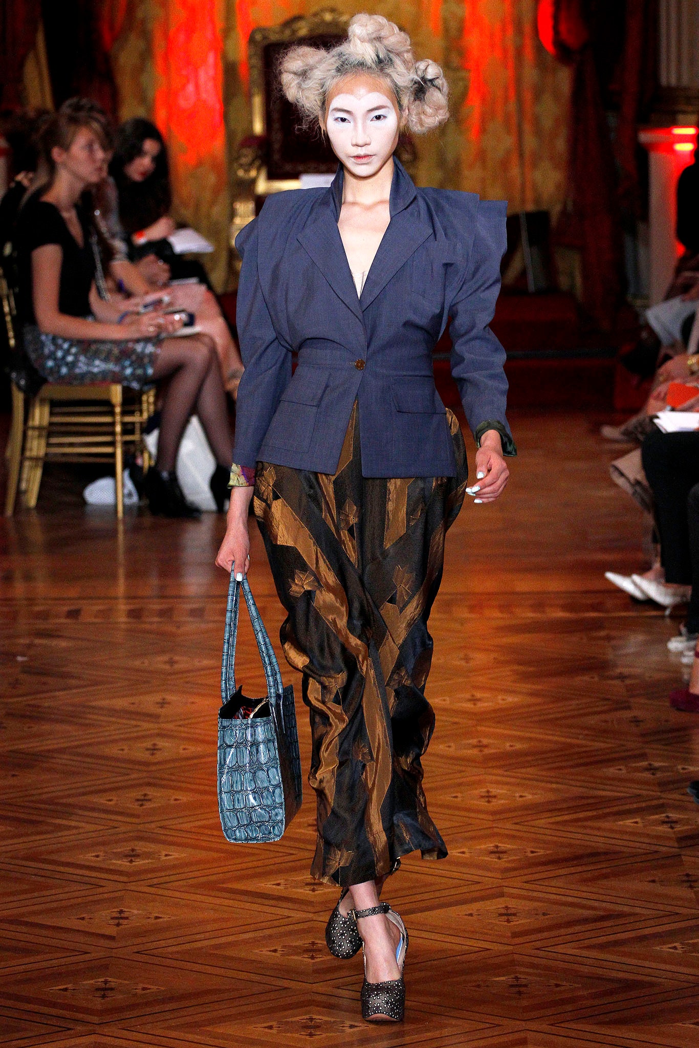 blue structured blazer with pleated pants