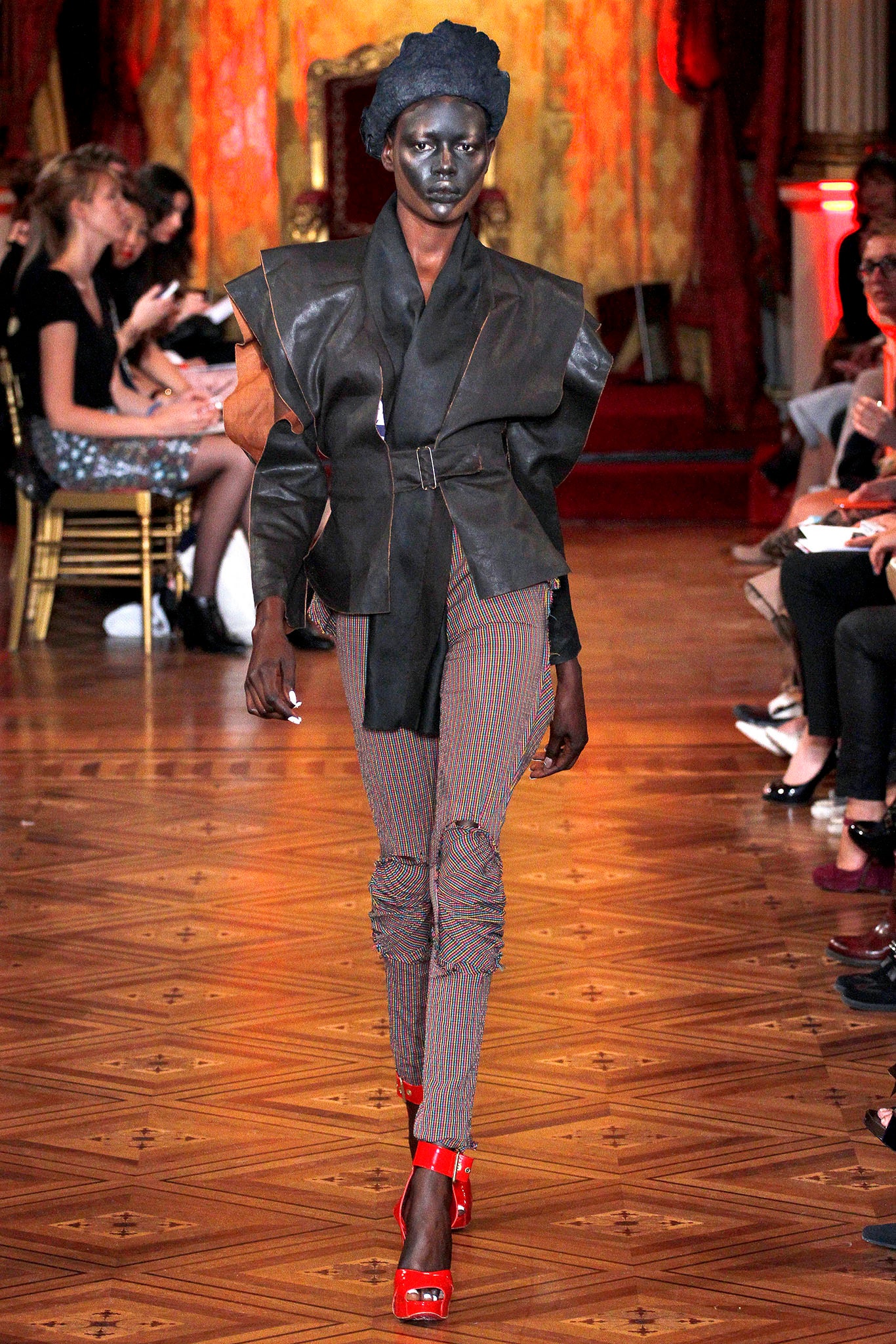 black leather long-sleeve collared structured layered jacket