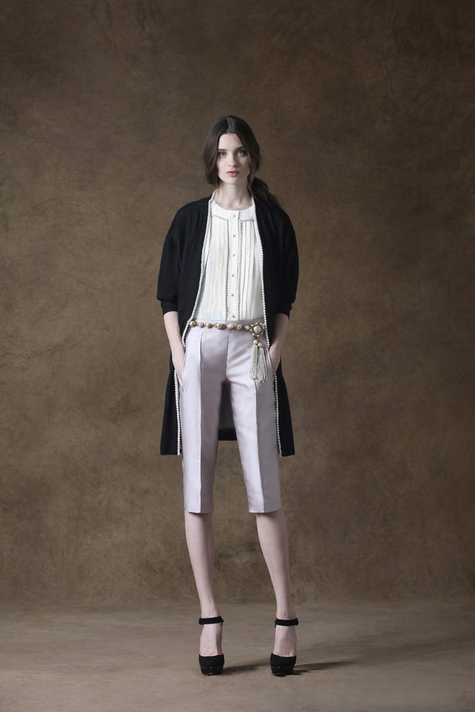 white silk blouse with black coat