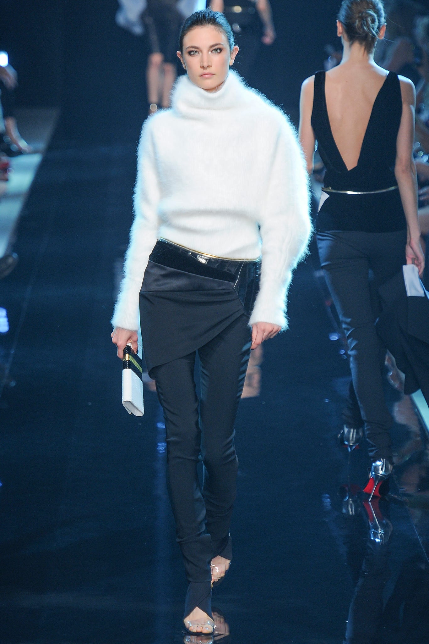 white fitted sweater and black pants