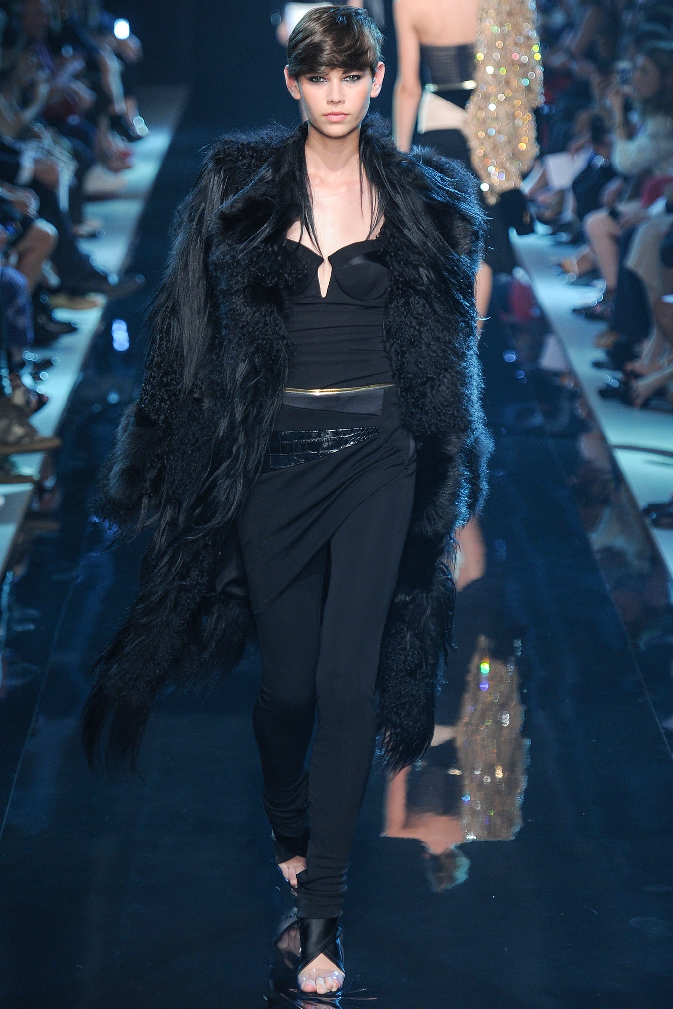 black fur coat with fitted top and pants