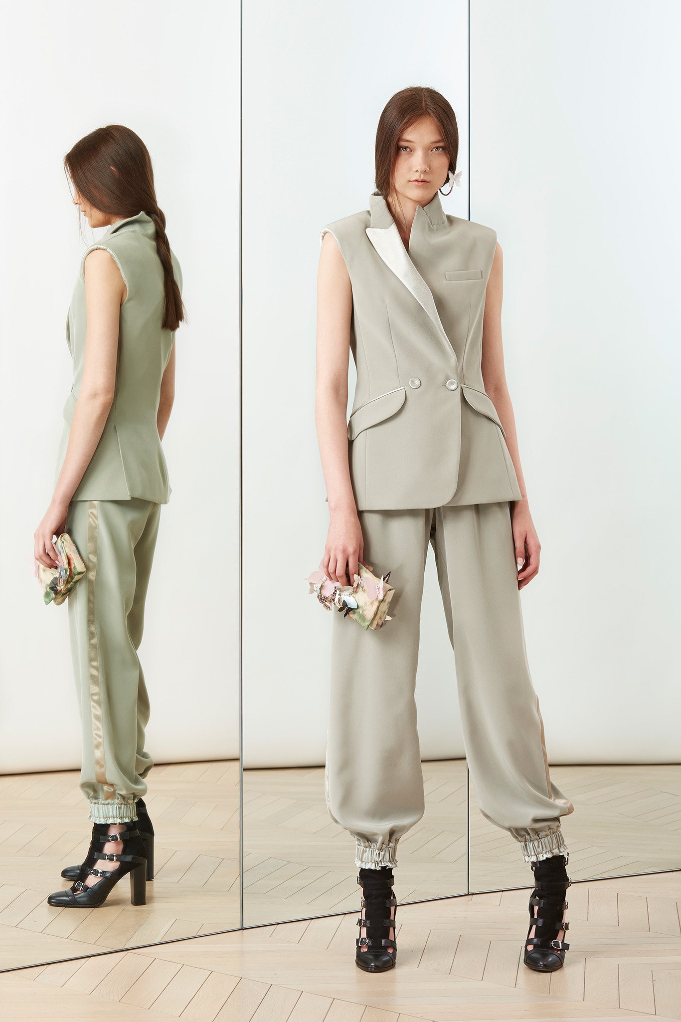 gray sleeveless blazer with relaxed pants