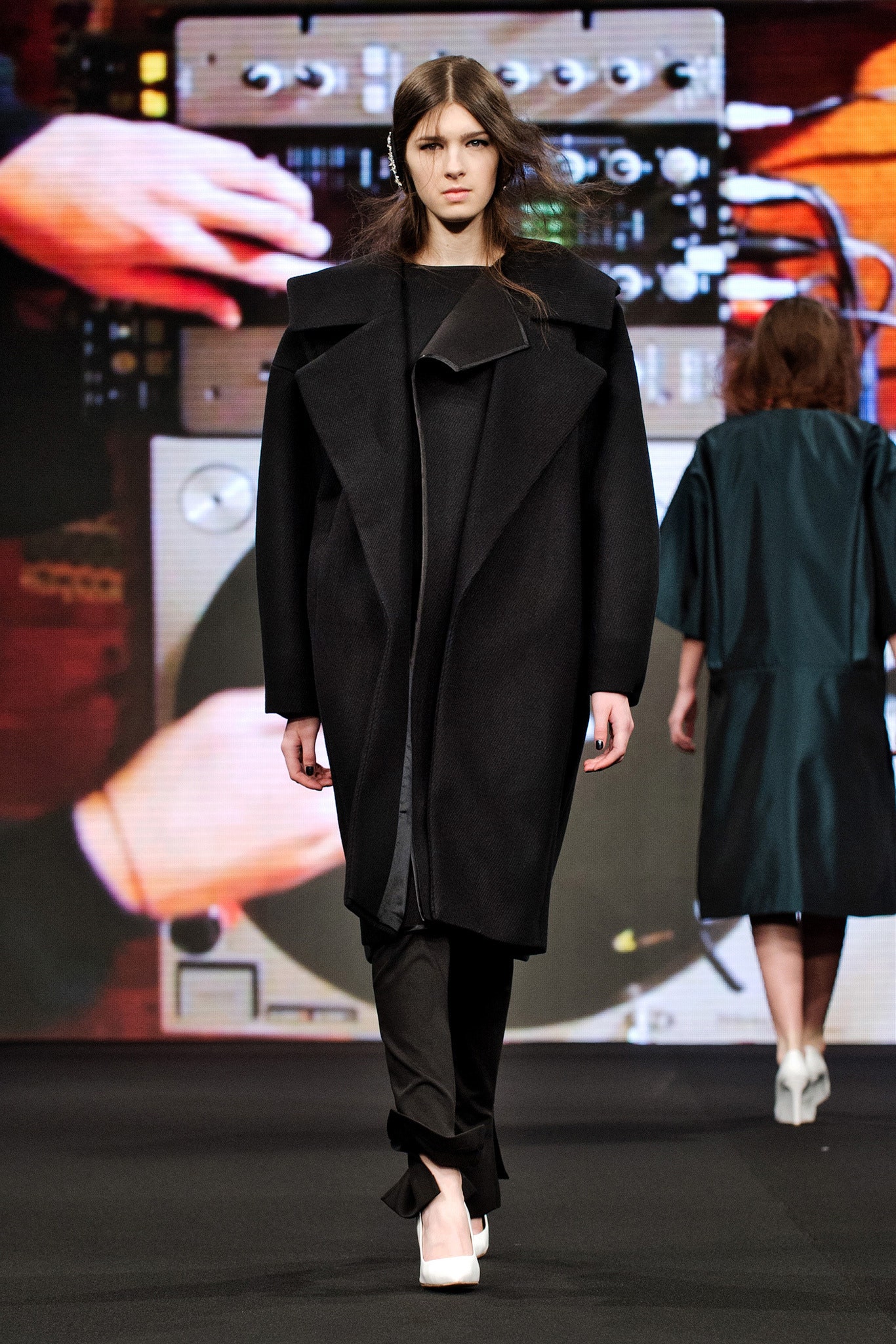 black wool coat with fitted pants