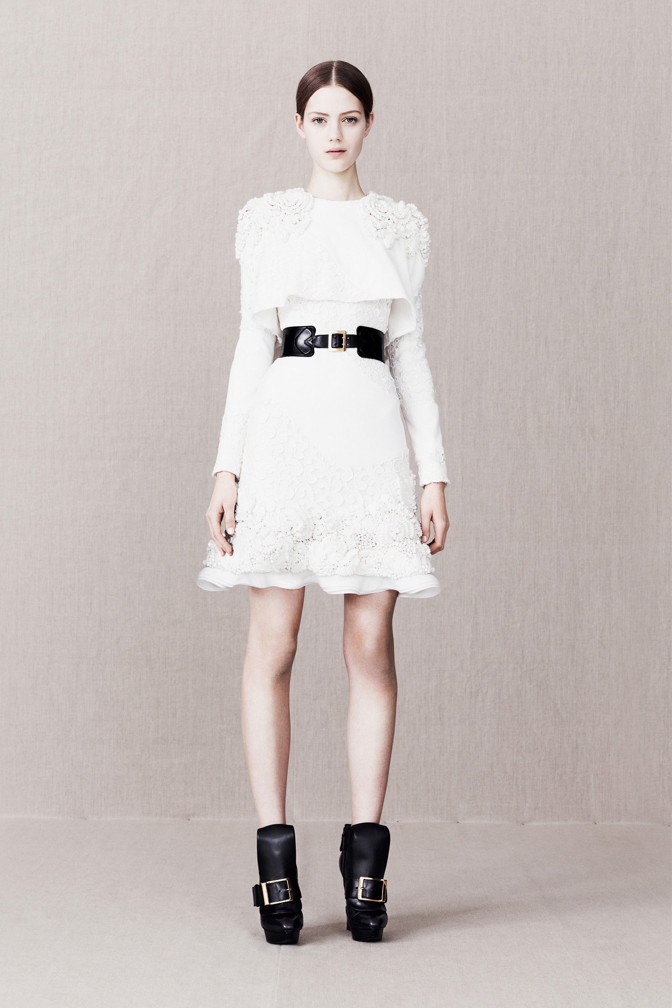 white silk long-sleeve high-neck fitted ruffled embellished dress
