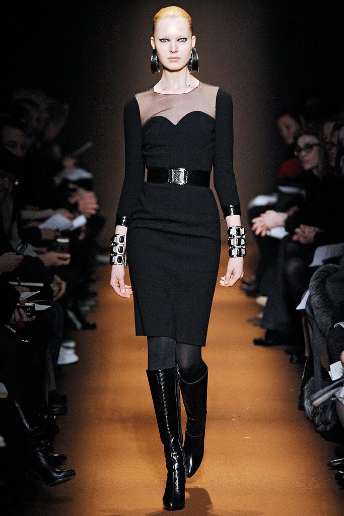 black fitted midi dress with boots