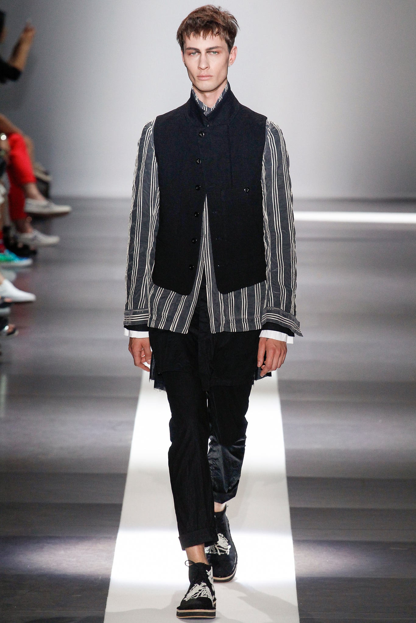 black fitted vest with striped shirt
