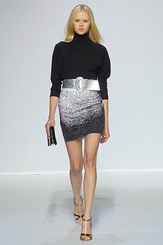 black fitted top with mini skirt