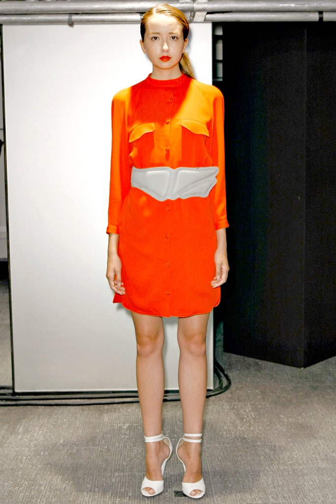 red fitted dress with white belt