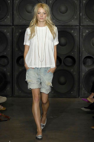 white relaxed top with denim shorts