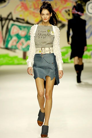 gray fitted top with blue skirt