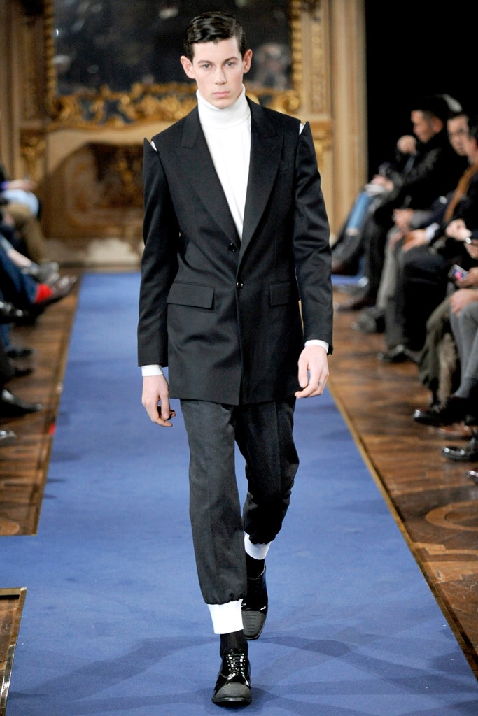 black tailored suit with turtleneck