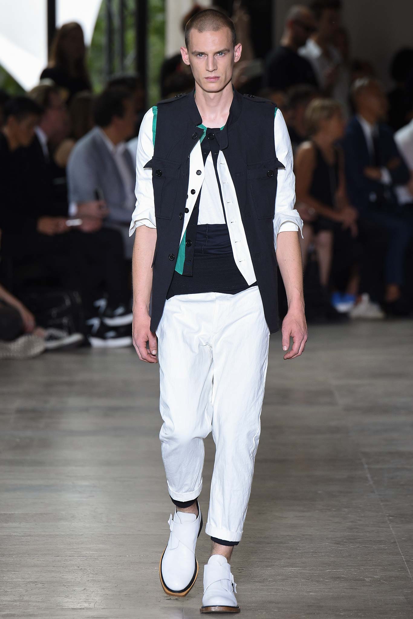 black vest white shirt relaxed pants