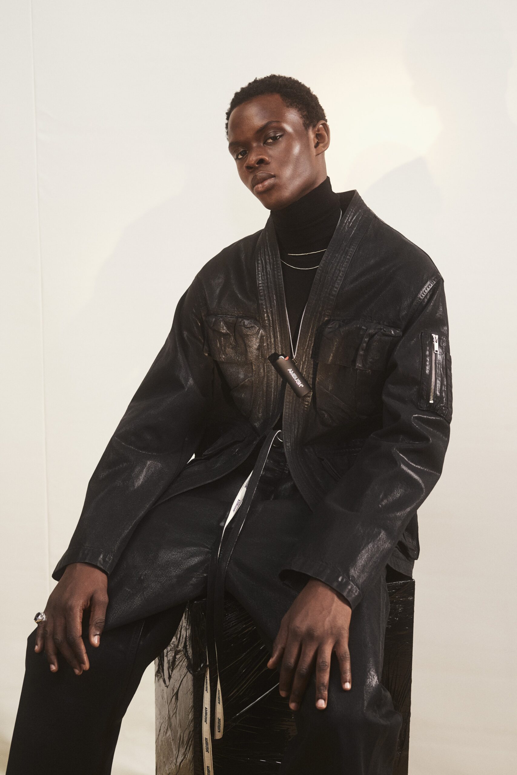 black leather jacket and turtleneck